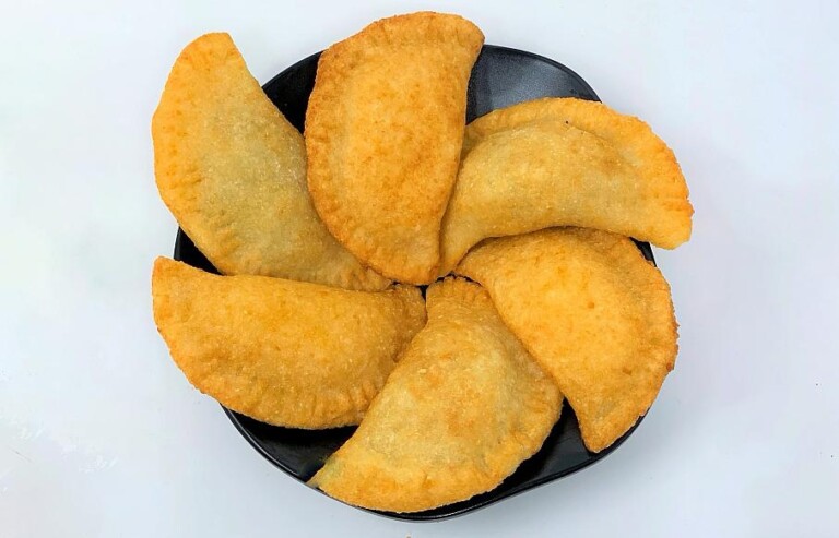 Haitiana usa empanadas para envenenar a presuntos pandilleros